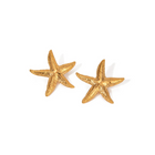 Starfish – Waterproof gouden oorbellen op witte achtergrond – Meena Rotterdam